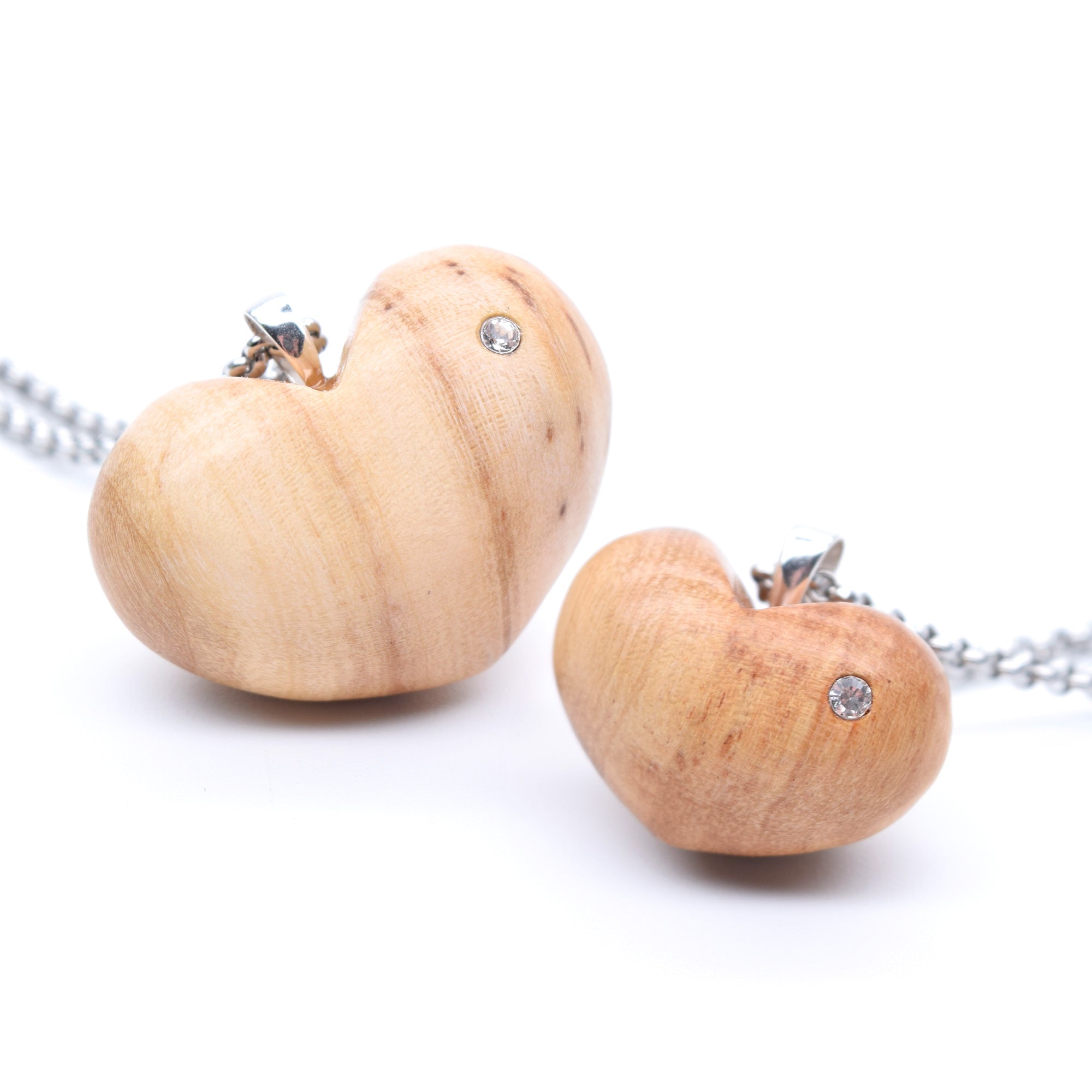 Wooden heart pendant + visible ash dust