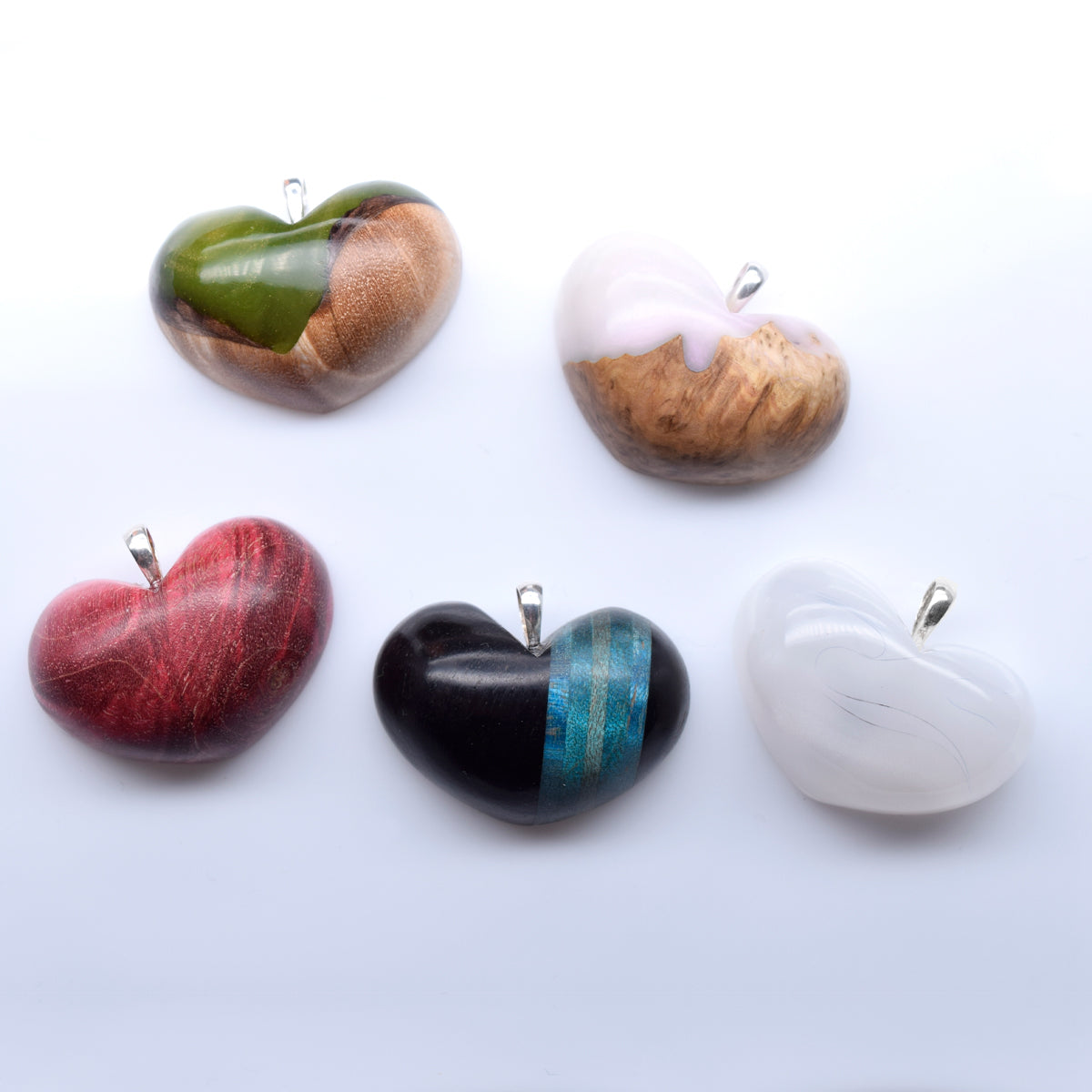 Wooden heart pendant + visible ash dust