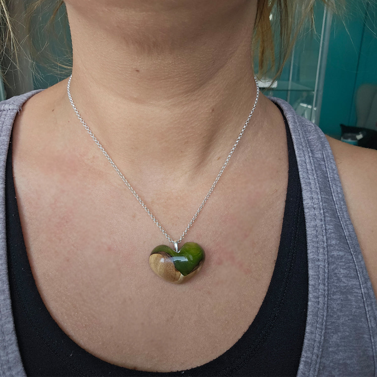 Wooden heart pendant + visible ash dust