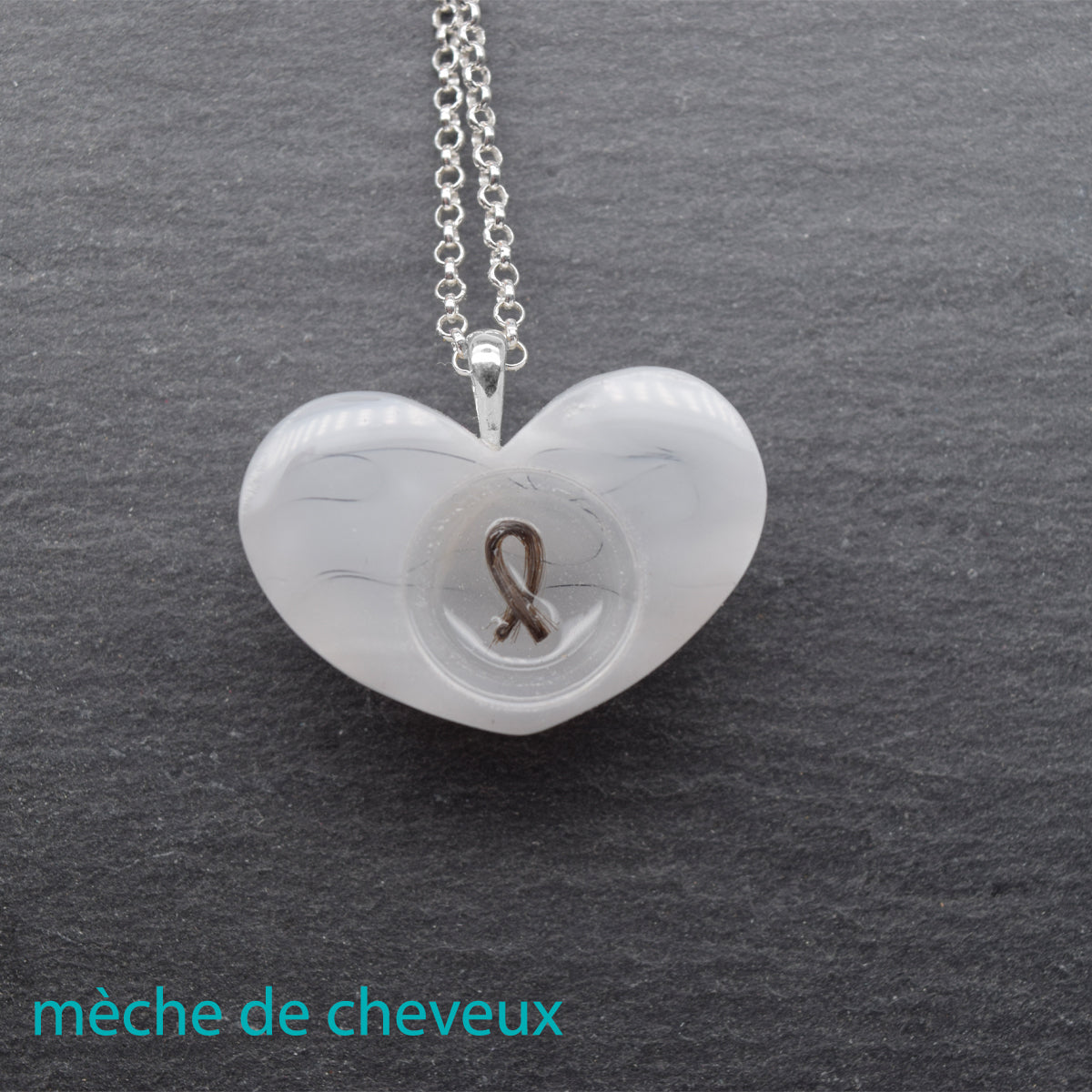 Wooden heart pendant + visible ash dust